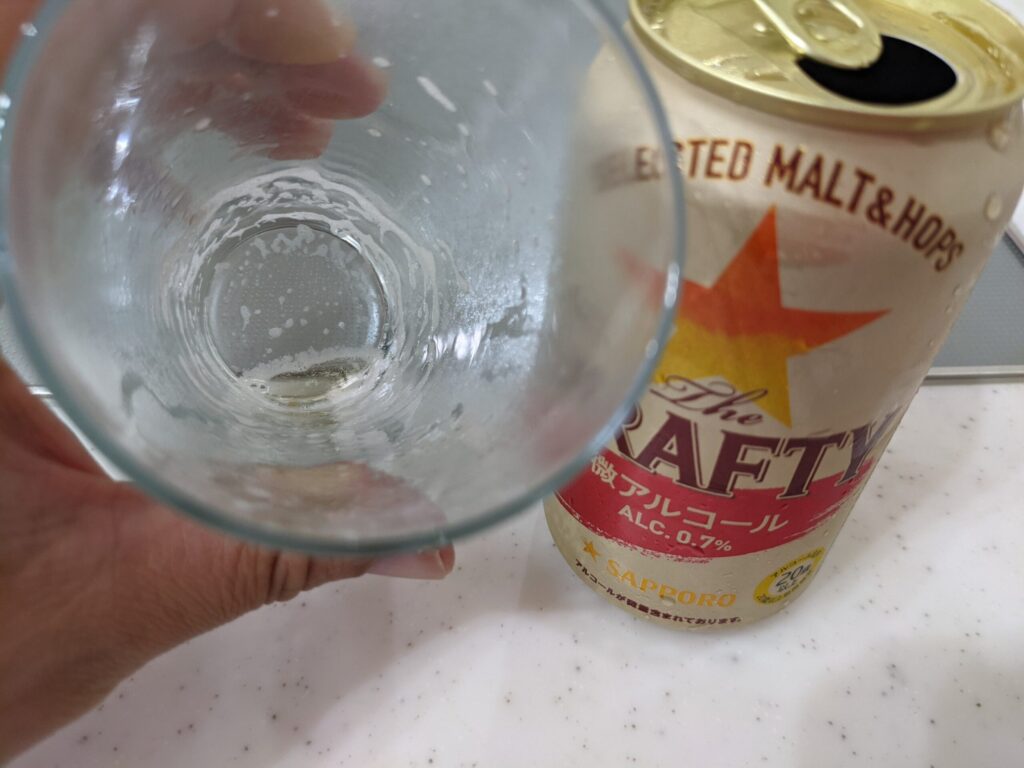 飲み終わったサッポロザ・ドラフティのコップ
